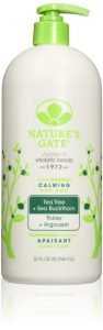 A bottle of Nature's Gate Tea Tree + Sea Buckthorn Calming Shampoo: Wholesale Natural Hair Products