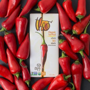 Theo Organic Dark Chocolate: Chili (70% cacao) surrounded by many red hot chili peppers (chiles).