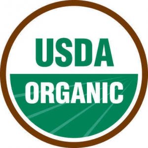 The round Usda Organic seal with green field.