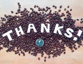 Coffee beans with the word "thanks" "
