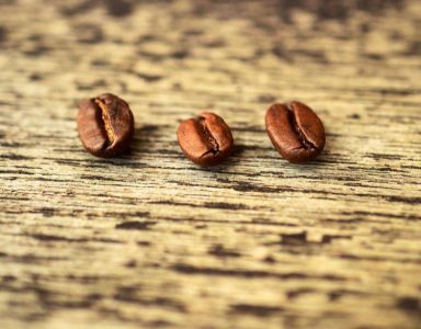 Three non-GMO coffee beans.