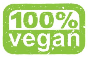 A green label that says "100% vegan." Vegans only eat plant-based food. 