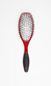 Spornette brush with looped bristles
