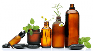 bottles of essential oils and herbs