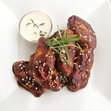 Sticky wings made with Gardein barbecue wings, a frozen vegan chicken alternative