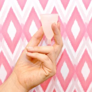 The DivaCup Instagram post of hand holding menstrual cup