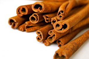 A pile of cinnamon sticks. 