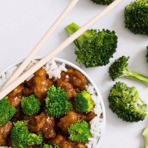 General Tso's Chicken with chopsticks and broccoli
