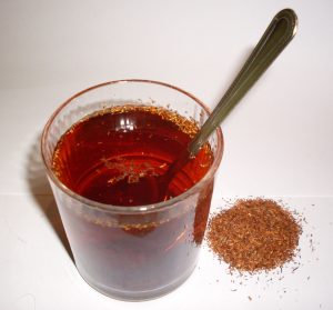 rooibos tea in a glass with dried rooibos