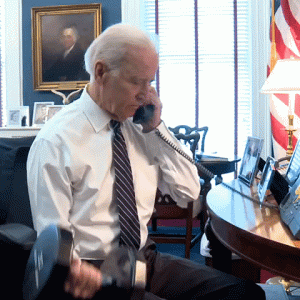 joe biden lifting weights while looking to buy organic protein powder