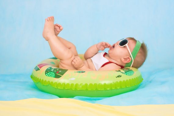 baby floating on water
