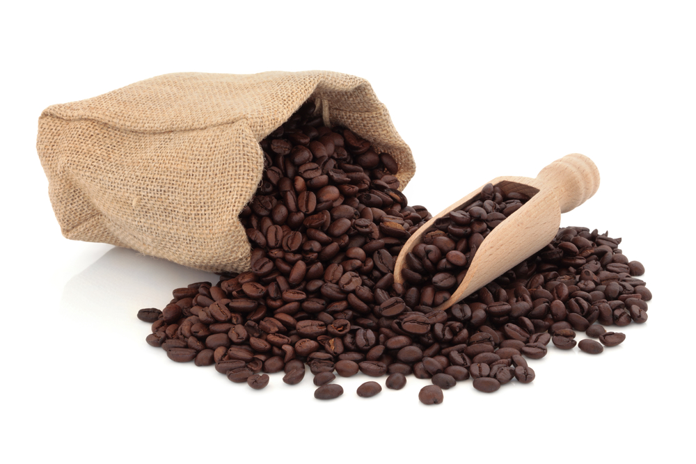 Bag of whole coffee beans with tips for how to choose a retail model to sell coffee online