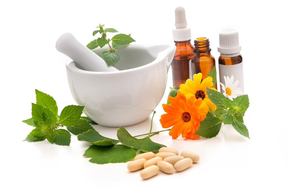 a mortar and pestle with homeopathic medicine ingredients