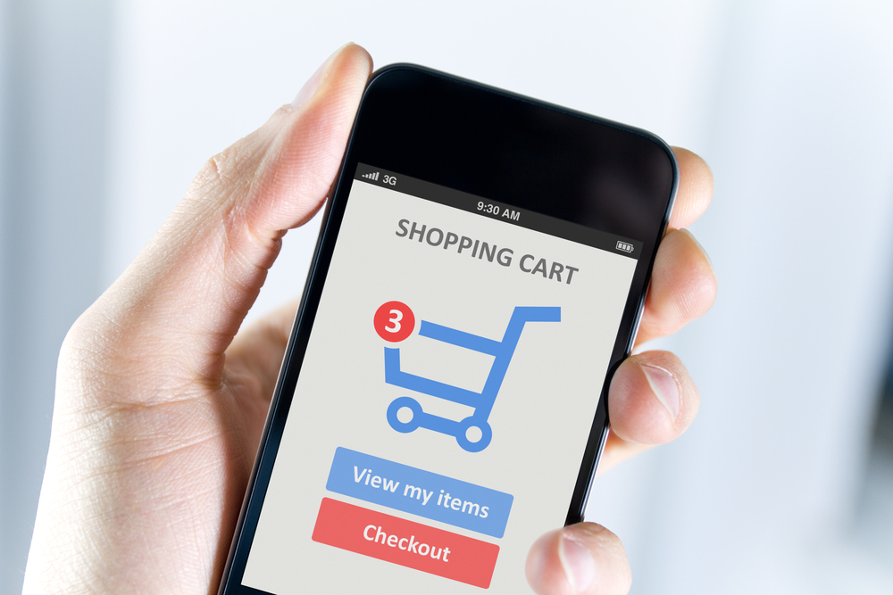 Marketing strategy for dropshipping: a smartphone with online shopping cart