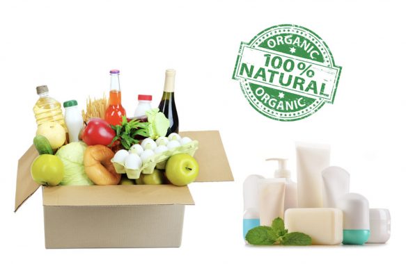 box of organic groceries next to organic beauty products