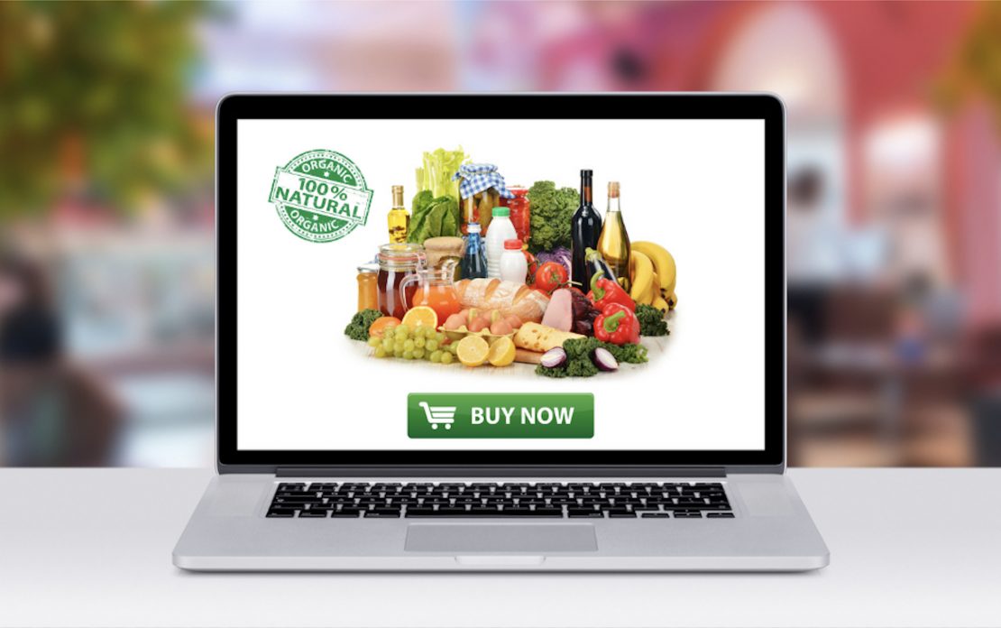 Shopify trending products. a laptop showing selling food online