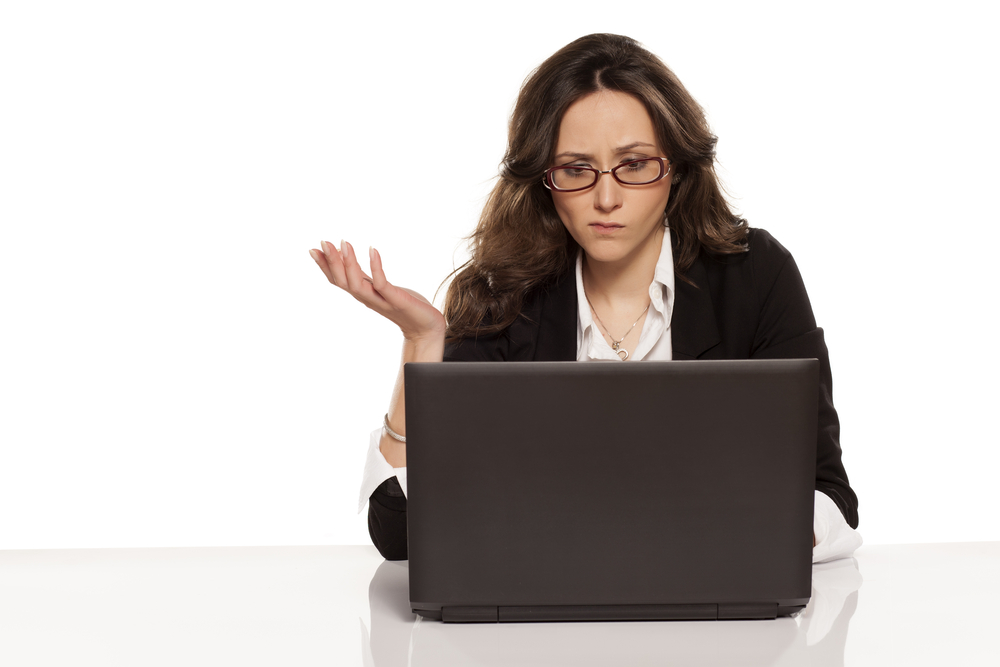 confused woman on laptop