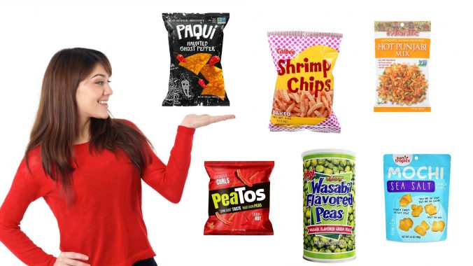 woman in red pointing to a bunch or exotic snacks