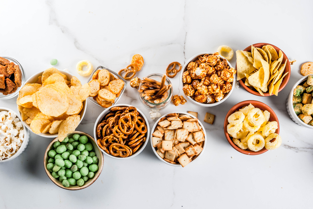 wholesale exotic snacks in bowls on a white table