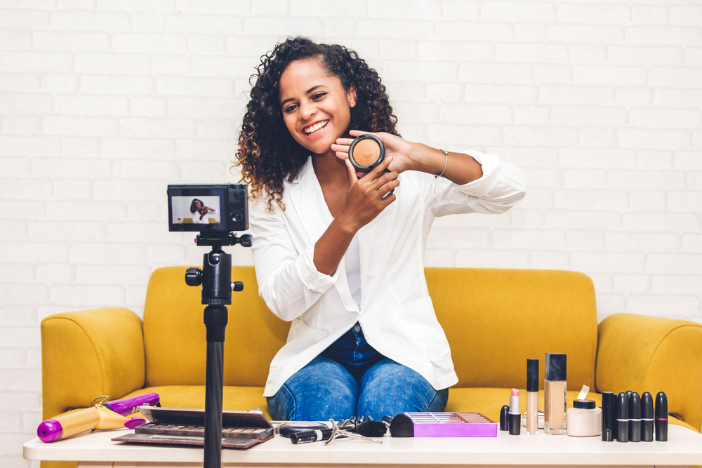 woman making a video to sell beauty products. video content marketing